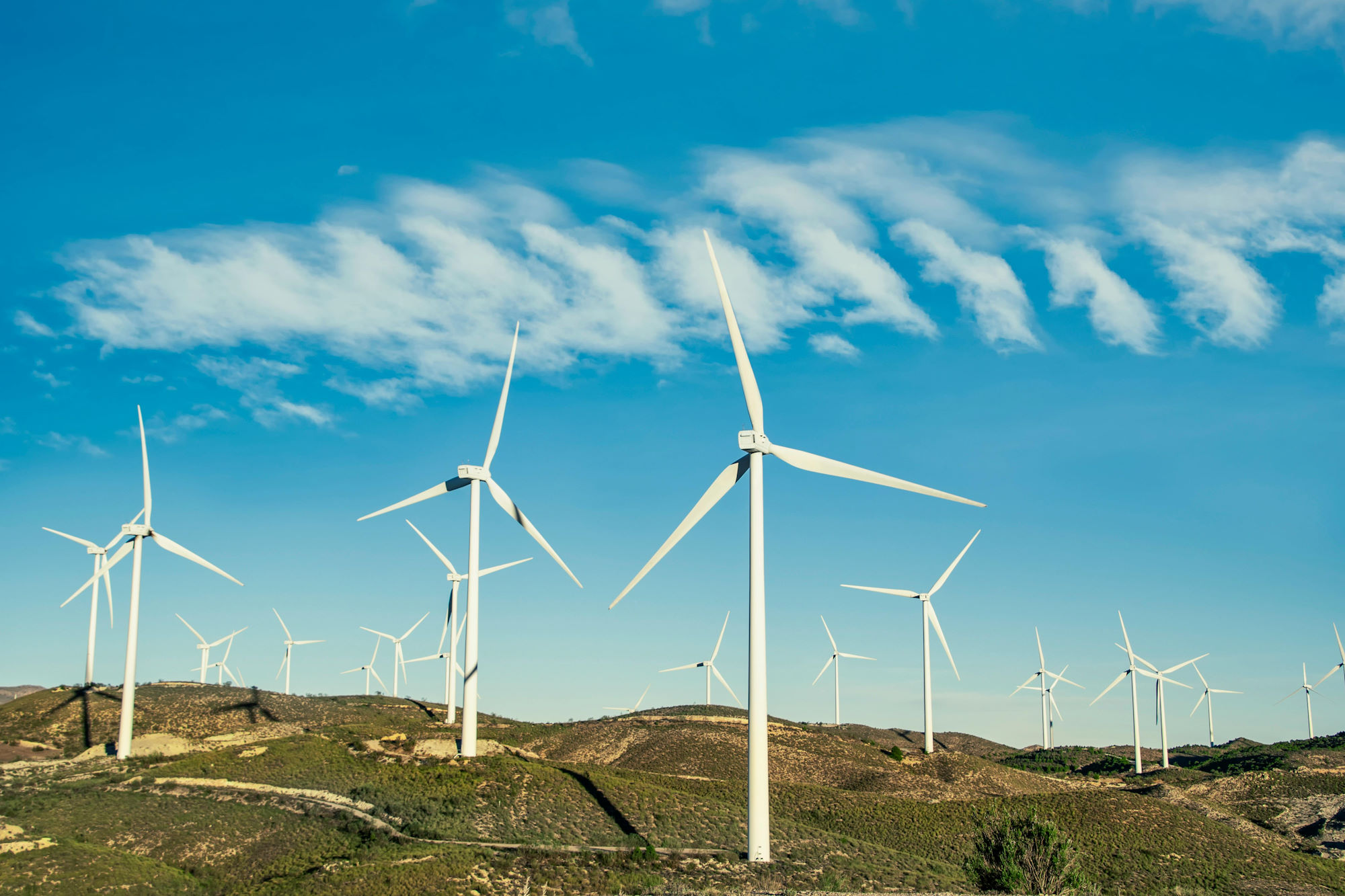 Modern Wind Turbines in Open Landscape Modern Wind Turbines in Open Landscape