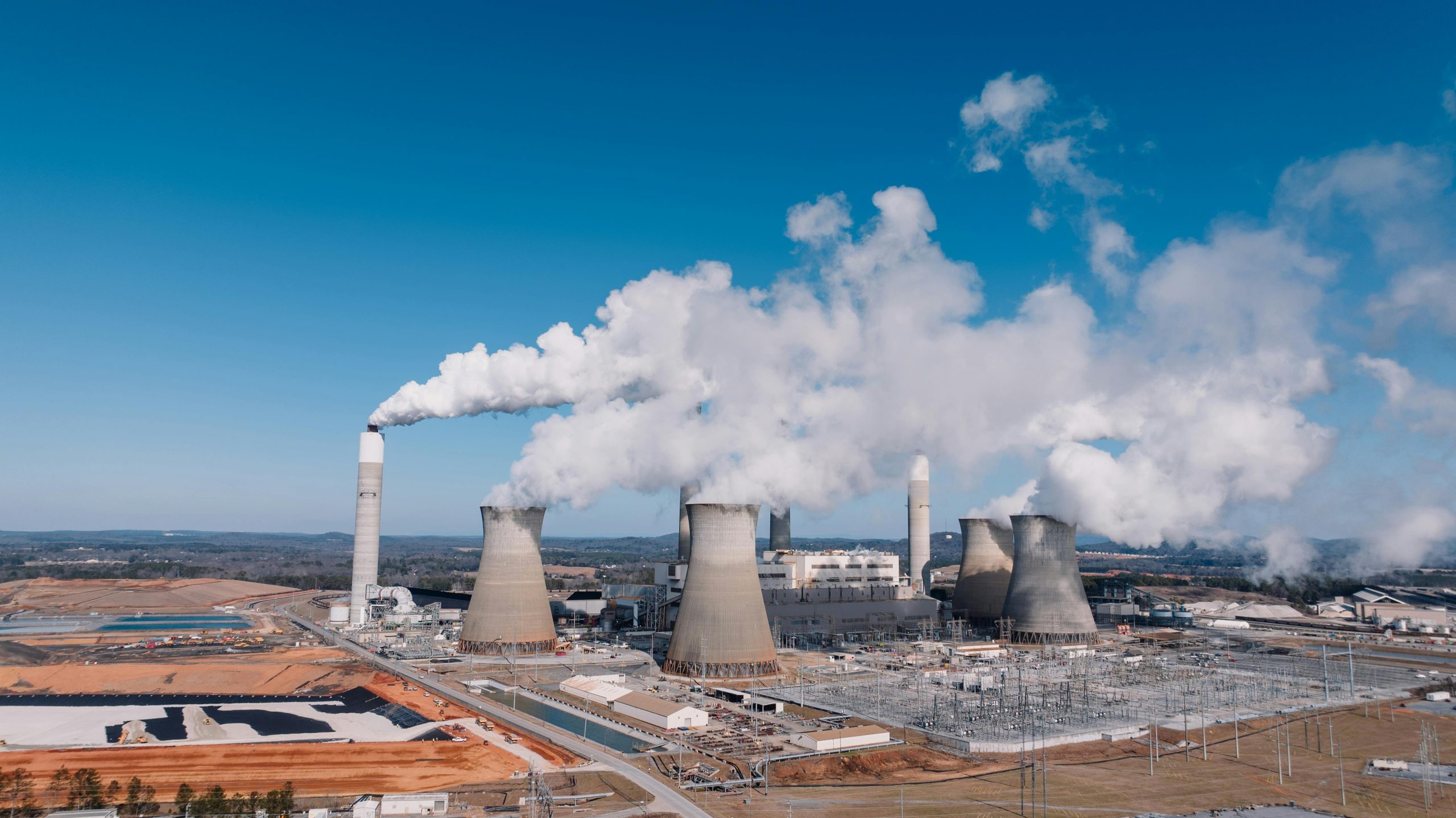 Industrial power plant with cooling towers and steam Industrial power plant with cooling towers and steam